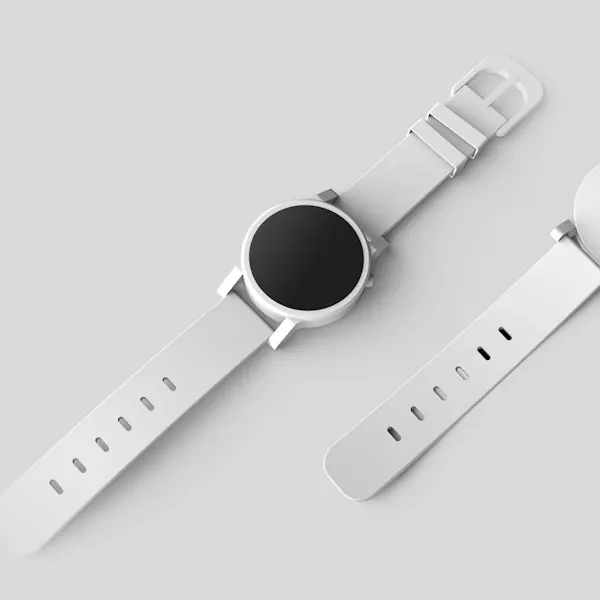 A white smartwatch on a light background